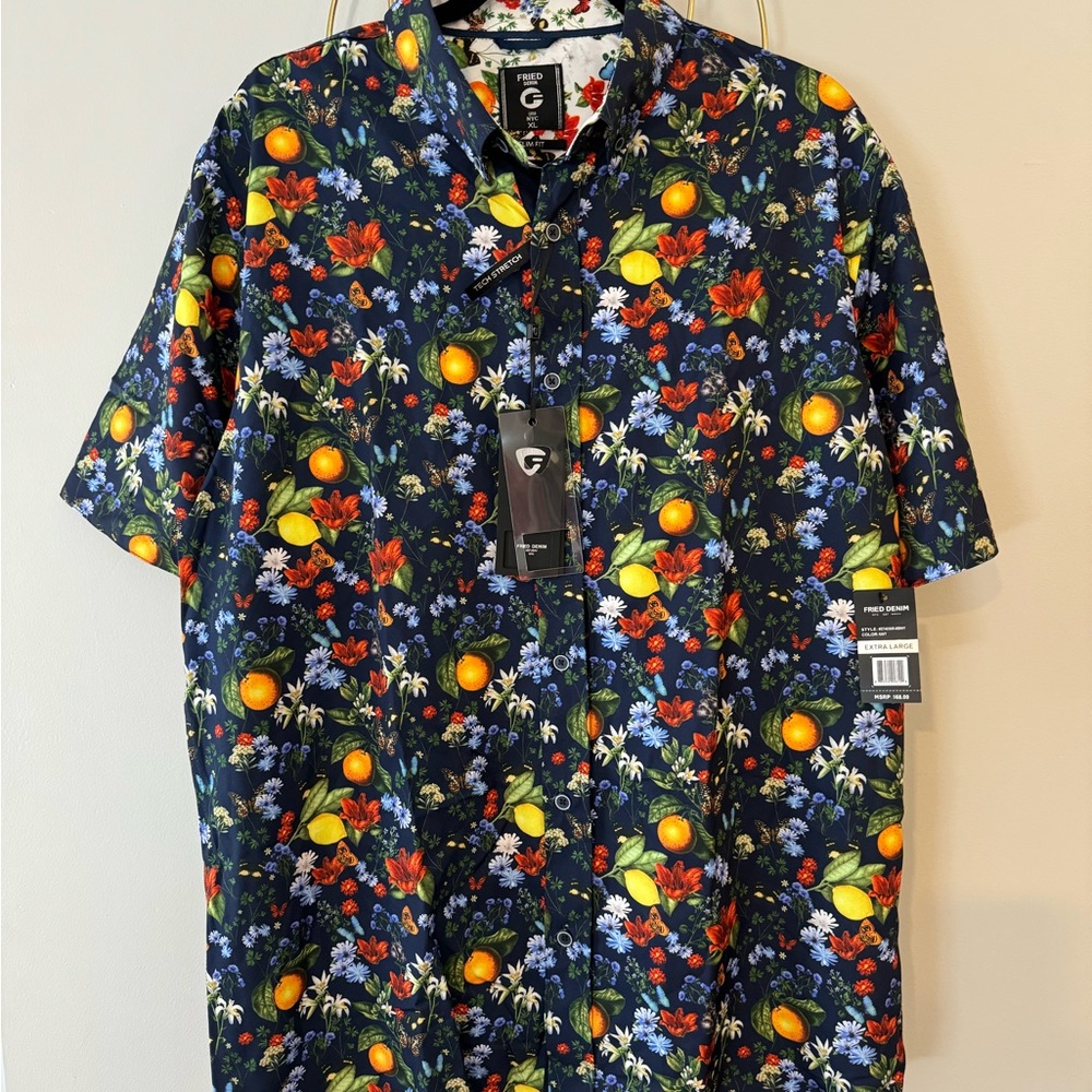 New with tags, unworn. Nice light weight, non wrinkle fabric